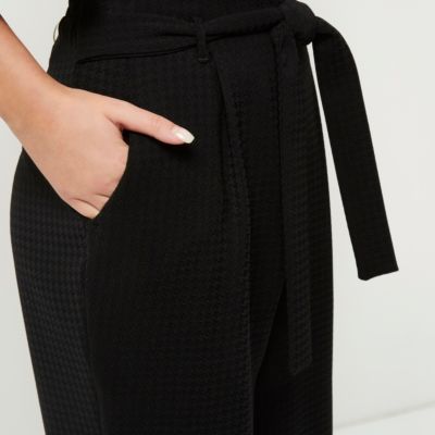 Black tapered houndstooth trousers